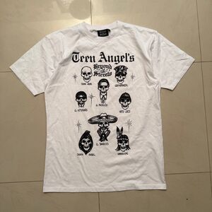 BEYOND THE STREETS Teen Angel's "Calavera" White Tee